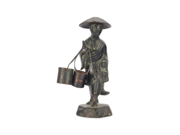 Figure of an Asian man