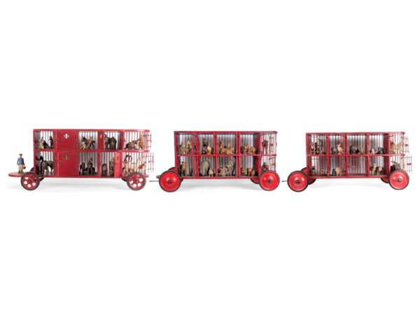 Circus wagons with animals and keeper