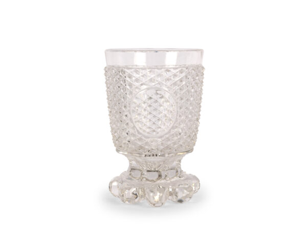 Footed cup with stone cut