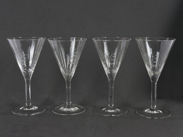 Four stemmed glasses